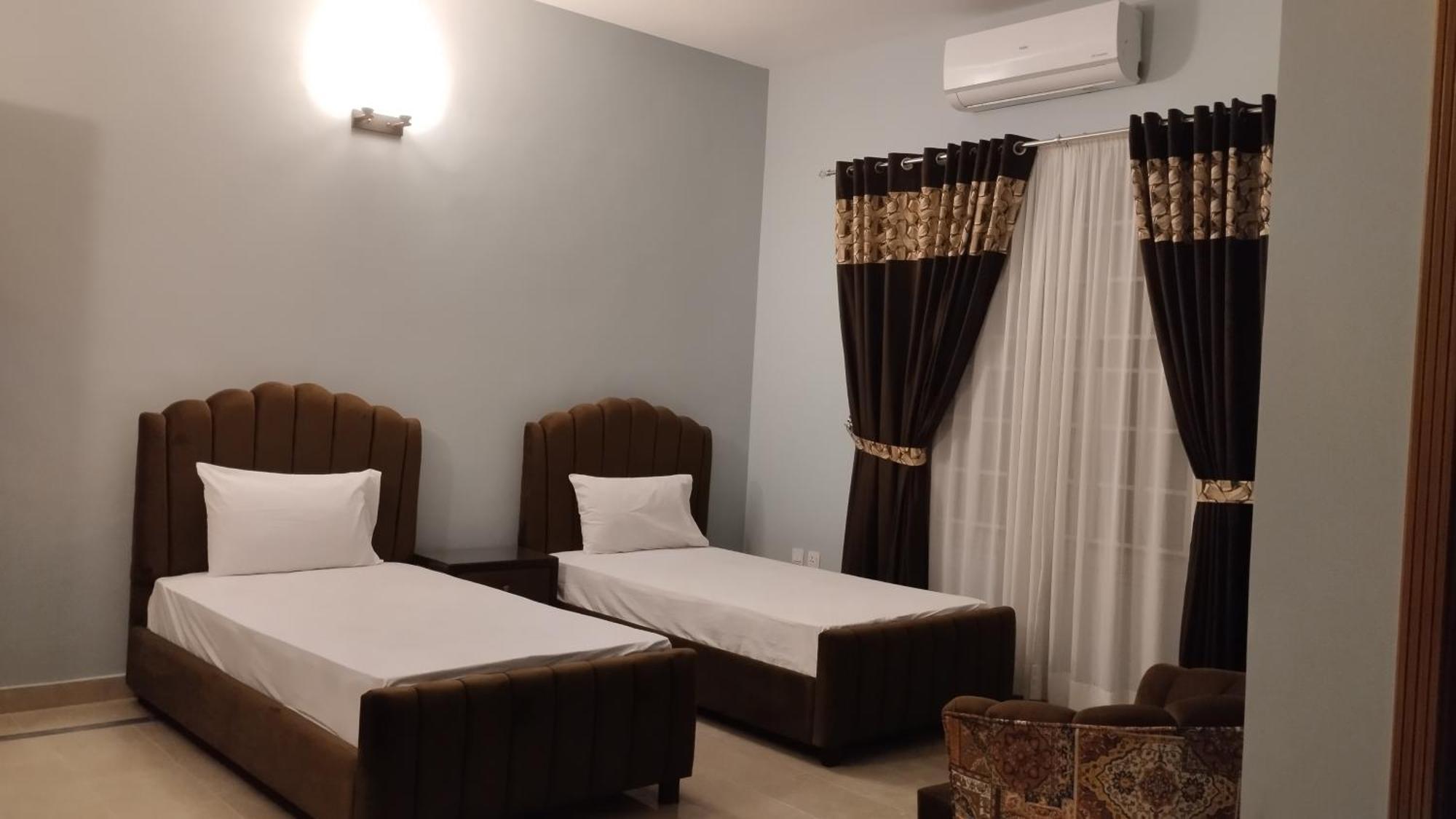 Islamabad Travelodge Guest House Værelse billede